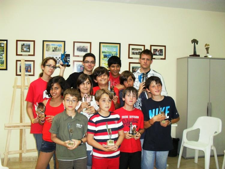 Los ganadores de las distintas categorías en la clasica foto de familia