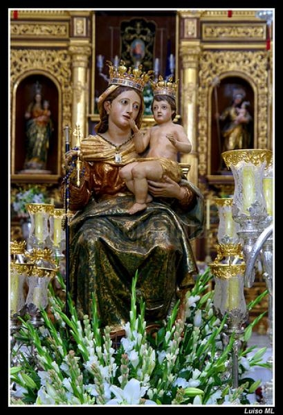 El Melilla rindió la ofrenda floral a la Virgen de la Victoria, Patrona de la Ciudad