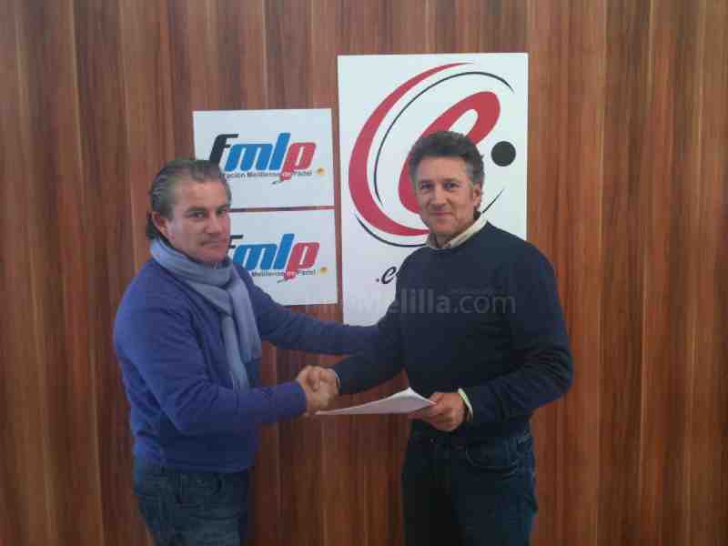 El presidente de la FMP Enrique Díaz- con el gerente de la firma comercial
