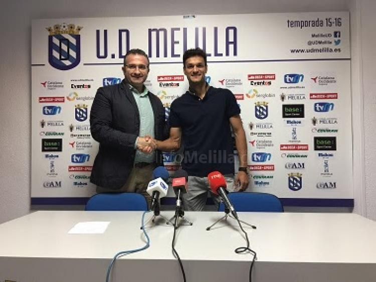 Presidente y jugador en la sala de prensa