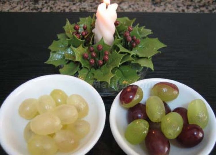 Un siglo poniéndonos hasta las trancas de uvas de la suerte